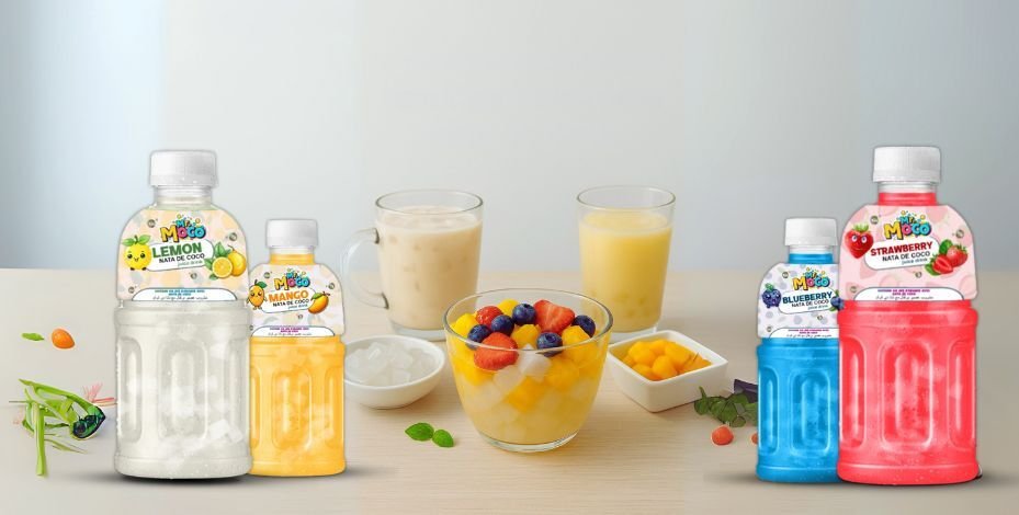 Refreshing nata de coco dessert with tropical fruits and iced coconut drinks, surrounded by fresh ingredients and toppings